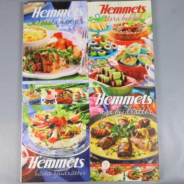 Fyra färgglada kokböcker ur Hemmets-serien med matfoton på omslaget