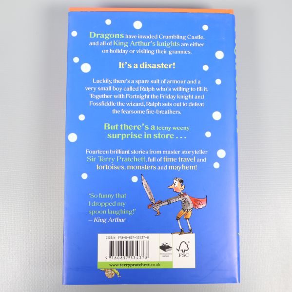 Baksida av Dragons at Crumbling Castle med bokbeskrivning och ISBN