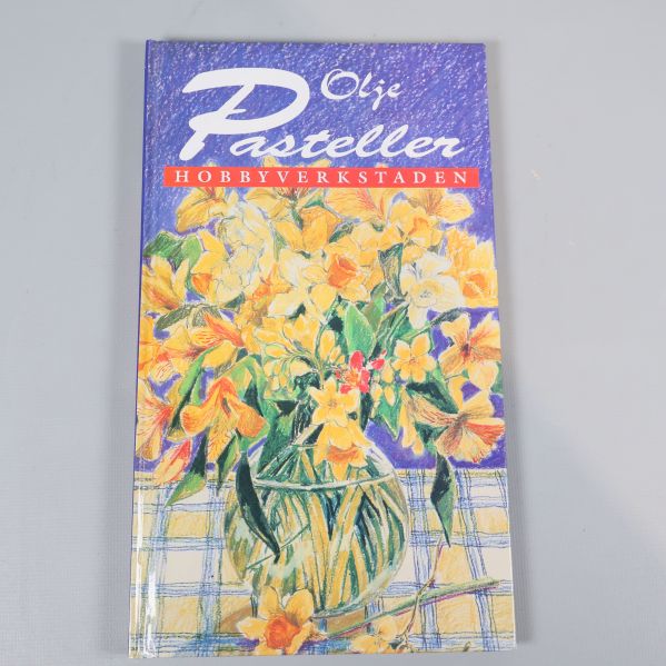 Omslag till boken Olje Pasteller med blomsterillustration