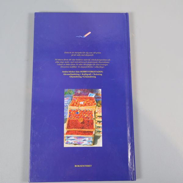 Baksida av boken Olje Pasteller med beskrivande text