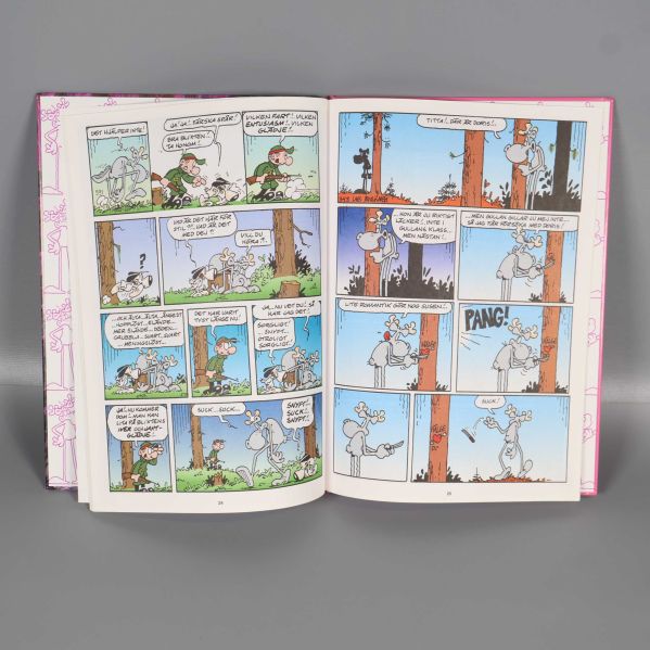 Uppslag i Hälge presentbok med färgglada serierutor