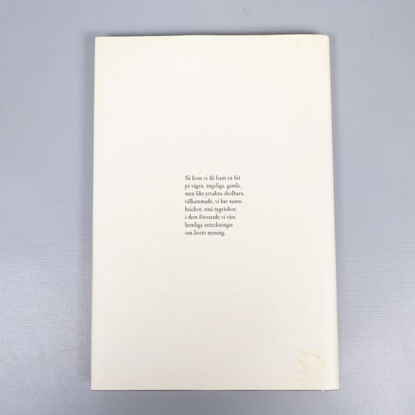 Baksida av boken Provliv 1-10 med ett stycke text i mitten