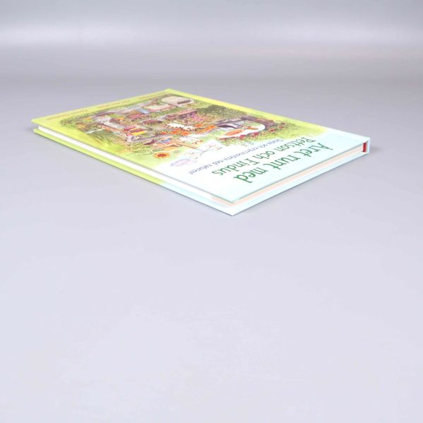 Boken Året runt med Pettson och Findus i sned vinkel med omslagets motiv synligt