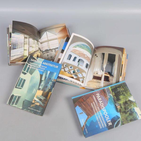 Uppslag av böcker med foton på moderna interiörer och exteriörer