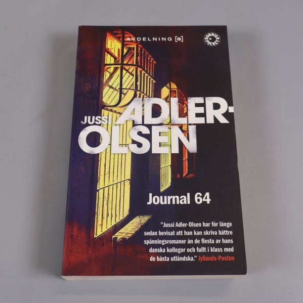 Framsidan av boken Journal 64 med färgstarkt illustrerat omslag