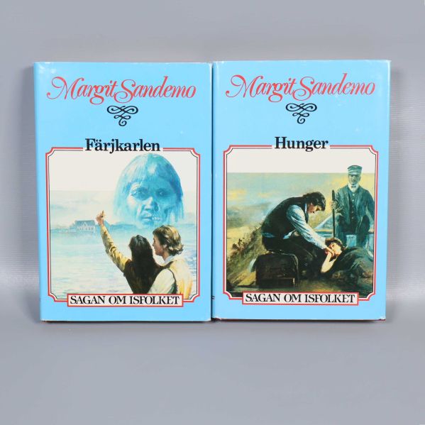 Två böcker med blå omslag ur Sagan om Isfolket, Färjkarlen och Hunger ligger sida vid sida