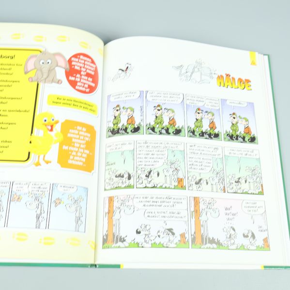 Uppslag med färgglad Hälge-serie och illustrationer