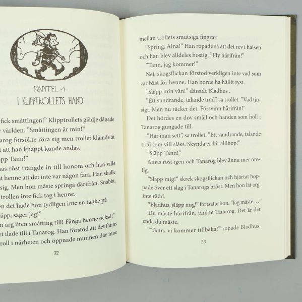 Uppslag ur Legenden om Tann med kapitel och text samt liten illustration