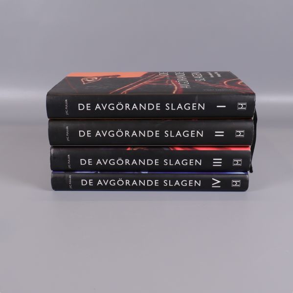 Böckerna De avgörande slagen staplade med synliga ryggar