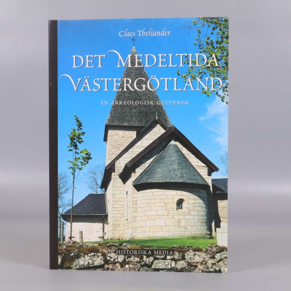 Framsida av boken Det medeltida Västergötland med kyrkobyggnad