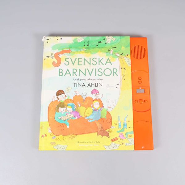 Svenska barnvisor bok med orange ljudpanel på sidan, illustrerat omslag