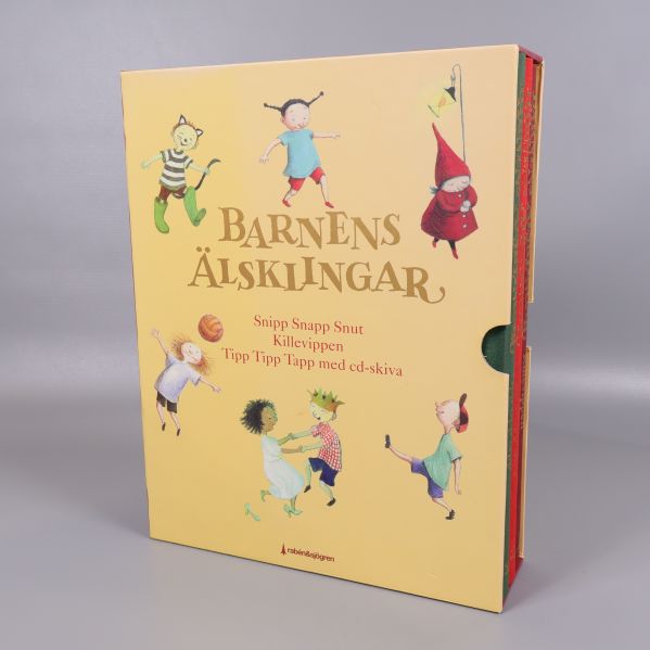 Framsidan av Barnens älsklingar box med illustrationer och titlar listade