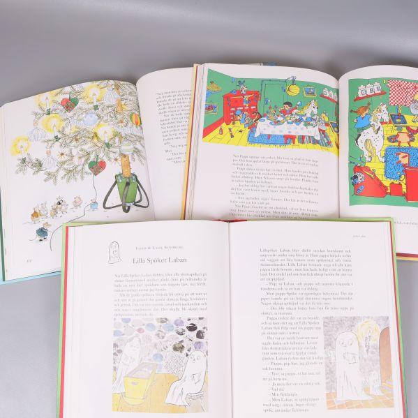 Uppslag med färgillustrationer och text ur Barnens älsklingar böckerna