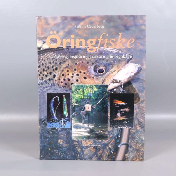 Framsida av boken Öringfiske med närbild på en öring