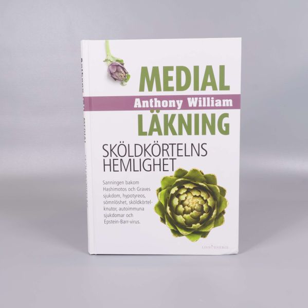 Medial läkning – Sköldkörtelns hemlighet upprätt stående mot grå bakgrund