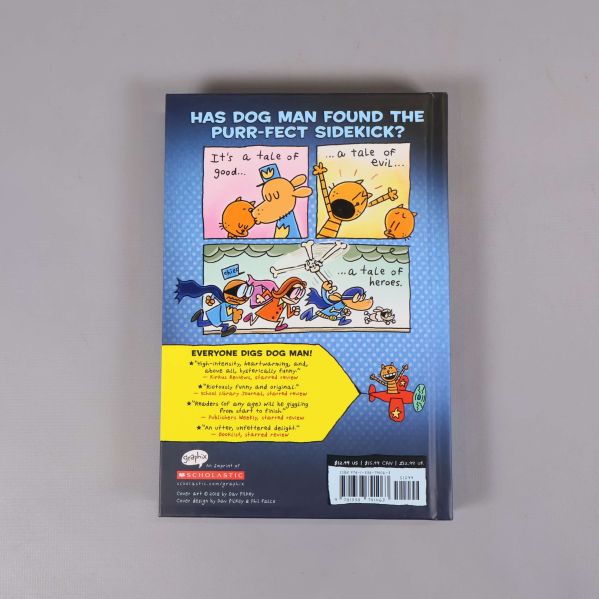 Baksida på Dogman And Cat Kid med serierutor och ISBN