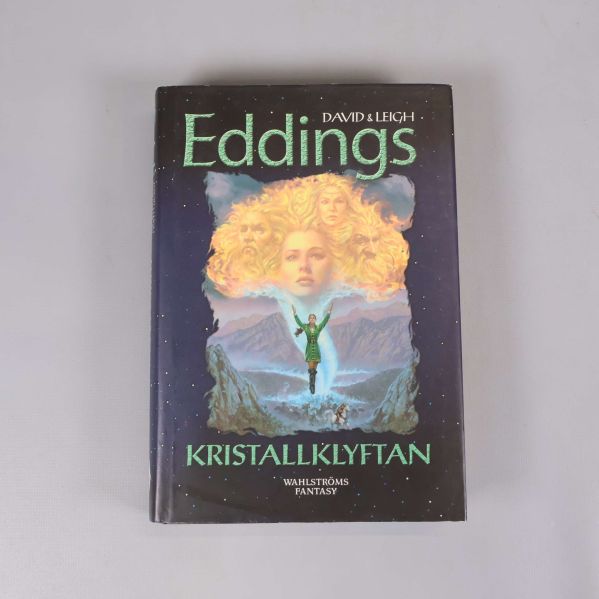 Framsidan av Kristallklyftan av David och Leigh Eddings med fantasymotiv