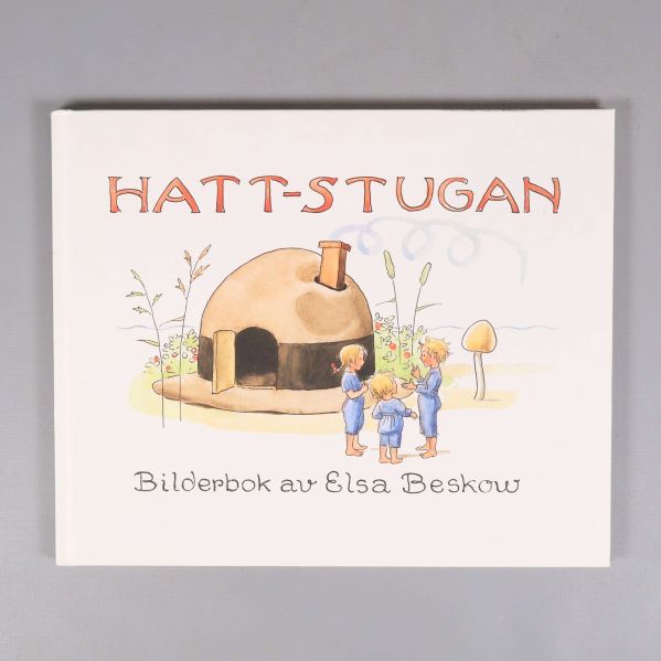 Omslag till boken Hattstugan med illustration av fyra barn och ett hus