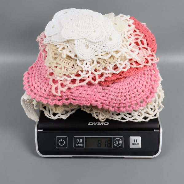 Virkade dukar som vägs på våg