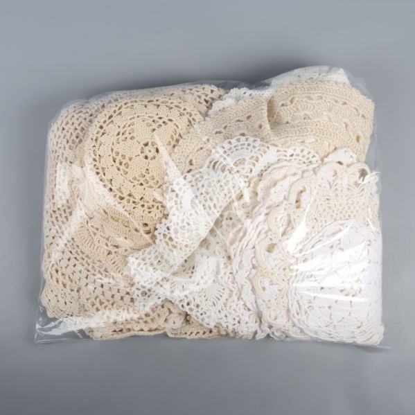 Virkade dukar förpackade i plastpåse