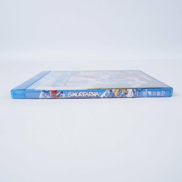 Smurfarna Blu-ray och DVD-fodral liggande med rygg synlig