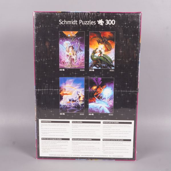 Baksidan av Schmidt pussel visar fler motiv i serien