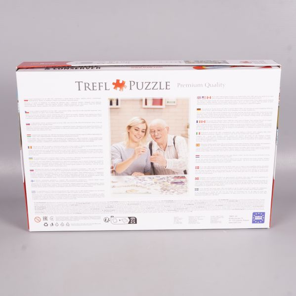 Baksida av Trefl pusselask med text och bild på personer som pusslar