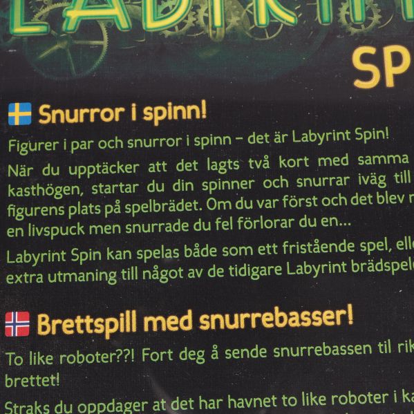 Detaljerad text om spelet Labyrint Spin på baksidan