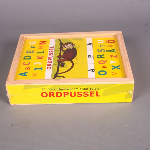 Ordpussel liggande, visar text om antal bitar