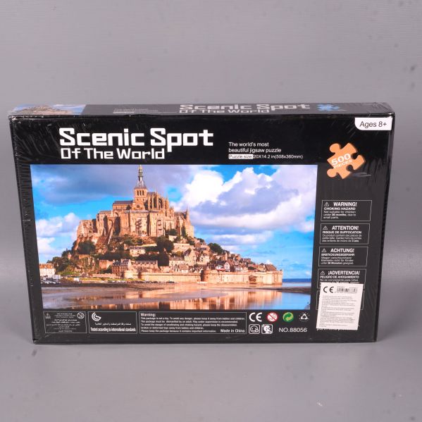 Baksida av pussellåda med information och motiv