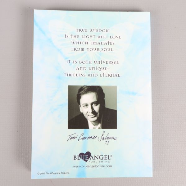 Baksida av guidebok med text och foto