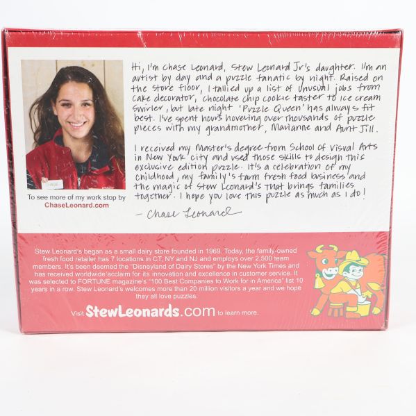 Baksidan av pusselkartong med bild och konstnärspresentation