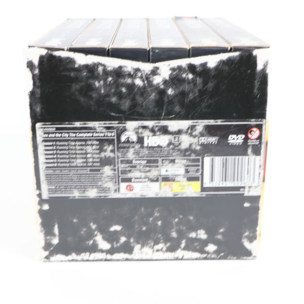 Baksidan av Sex and the City boxset med logotyper och specifikationer