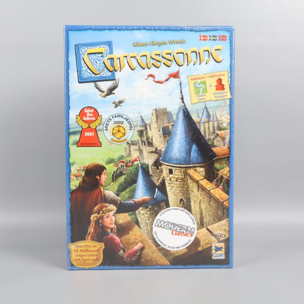 Framsidan av Carcassonne-spel med slottsmotiv och utmärkelser