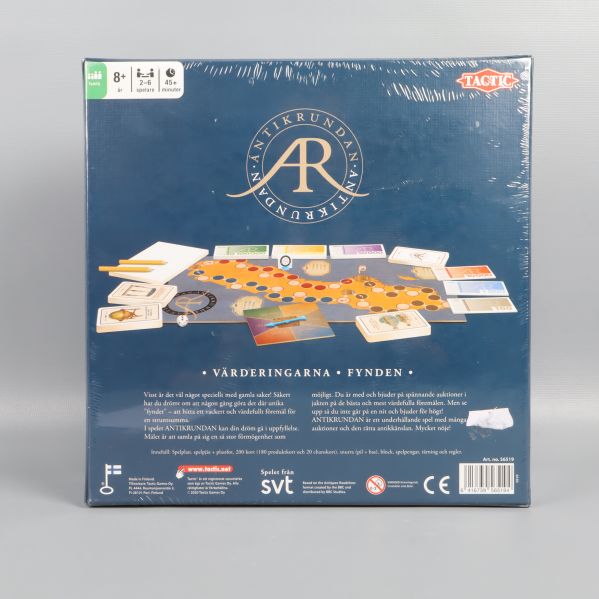 Baksidan av Antikrundan spelet visar spelplan och komponenter