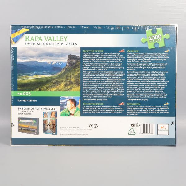 Baksidan av pusselask med Rapa Valley-motiv och textinformation