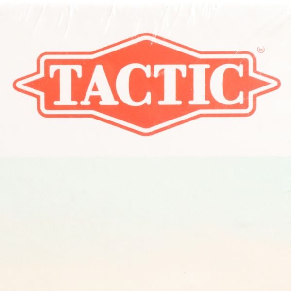 Tactic-logotyp i närbild på pusselask