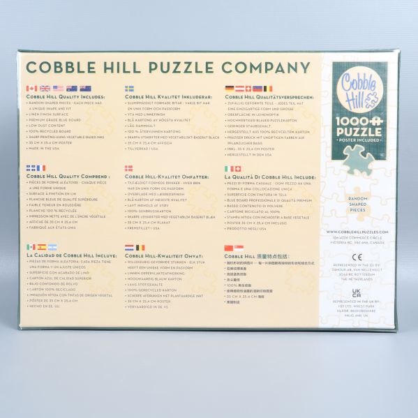 Baksidan av Cobble Hill pussellåda med företagsinformation