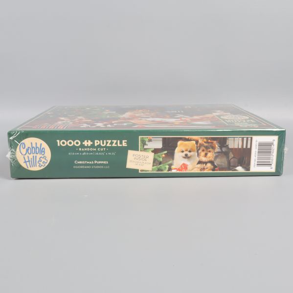 Sidan av Cobble Hill pussellåda med motiv och logotyp