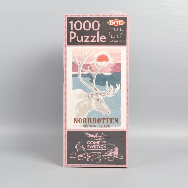 Framsidan av pusselförpackning med motiv av ren och natur