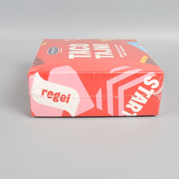 Sida av Taco Tajm spelförpackning med texten regel och start