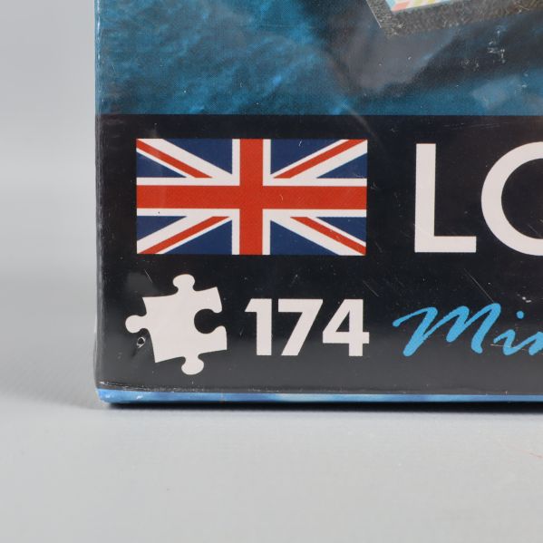 Närbild på antal pusselbitar, visar siffran 174