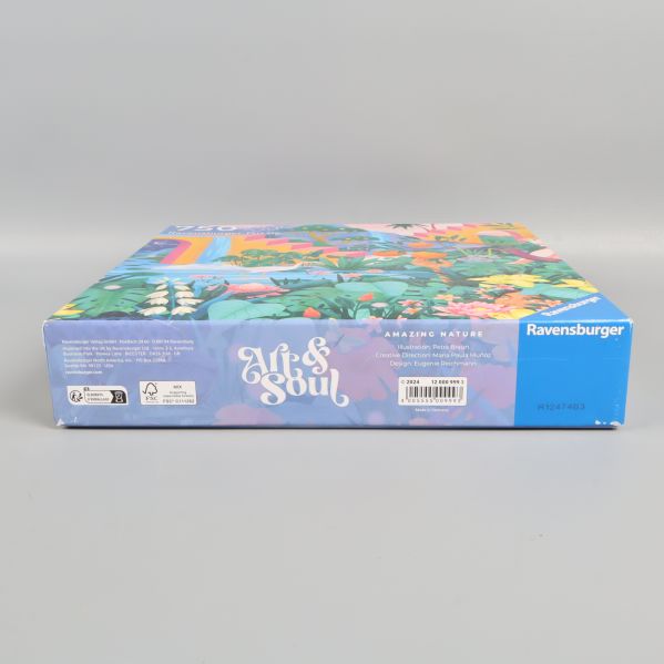 Pusslets kartong från sidan med Ravensburger-logga