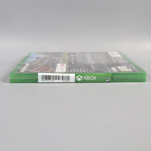 Xbox logotyp och streckkod på sidokant av fodralet
