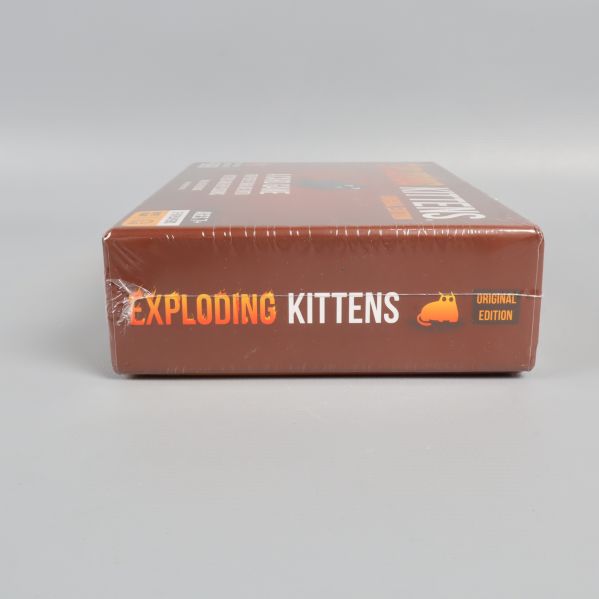 Exploding Kittens original edition logotyp på askens sida