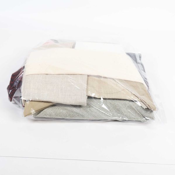 Tygbitar i plastpåse, flera färger synliga