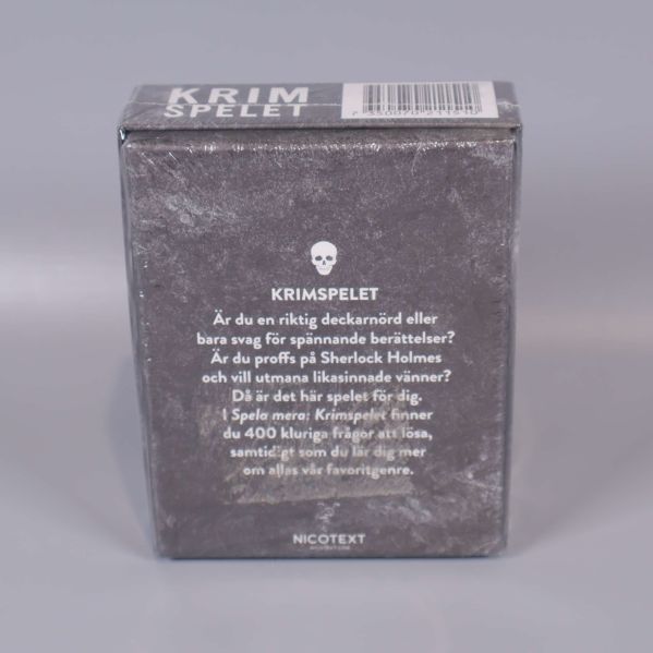 Baksidan av spellådan Krimspelet med beskrivning