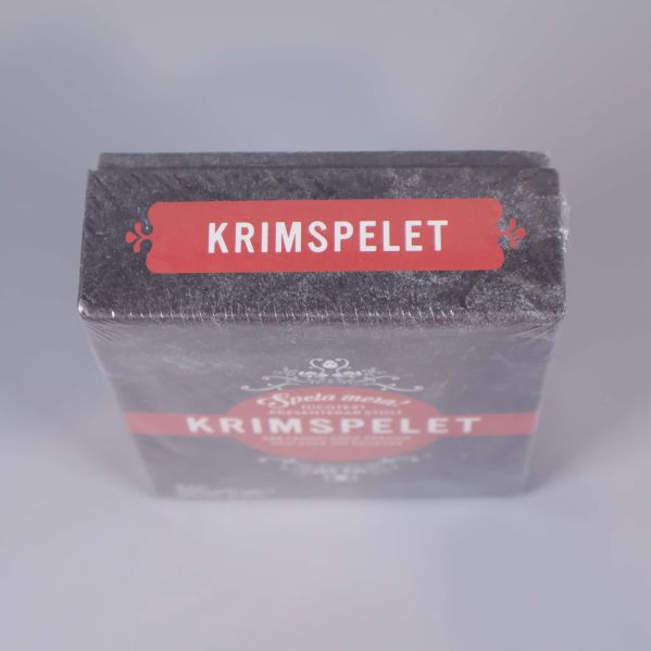 Ovansidan av Krimspelet med röd etikett och logotyp