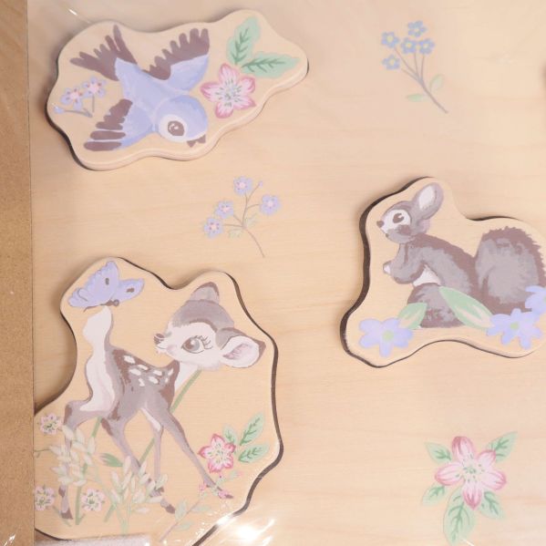 Närbild på tre av babypusslets djurmotiv