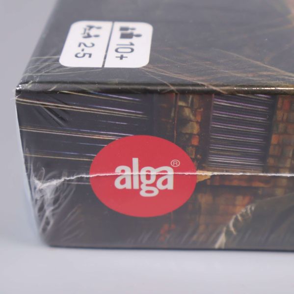 Närbild på röd alga-logga på spelkartong